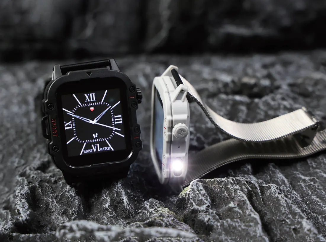 Rugged square smartwatches with a built-in flashlight resting on dark rock
