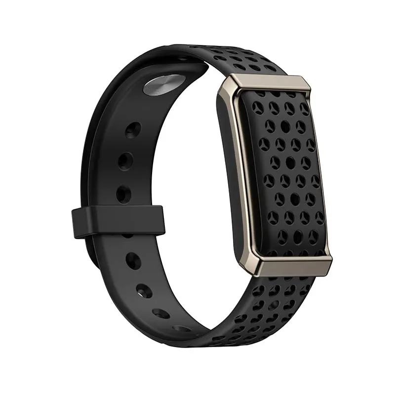 MYRYDER M12 screen-free fitness band, dark gunmetal alloy-framed case with an orange side button and a black perforated silicone strap — three-quarter view from the buckle side showing the strap loop